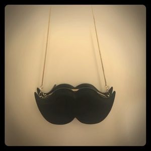 KATE SPADE MUSTACHE CROSS BODY BAG